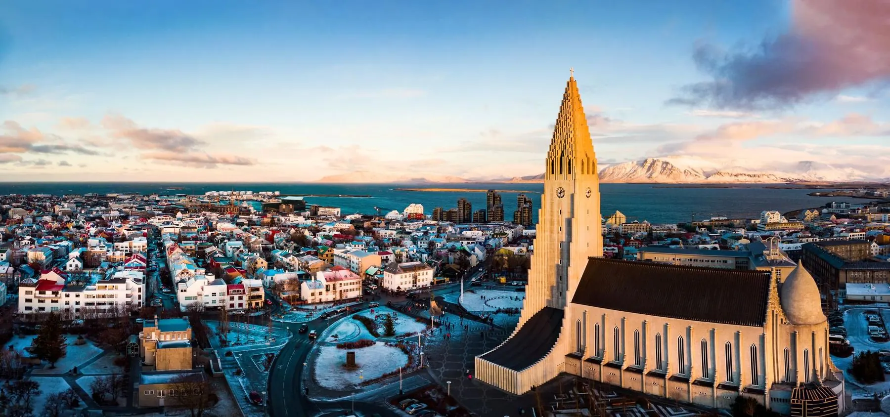 Reykjavík at dusk, Hallgrímskirkja rising above the rooftops