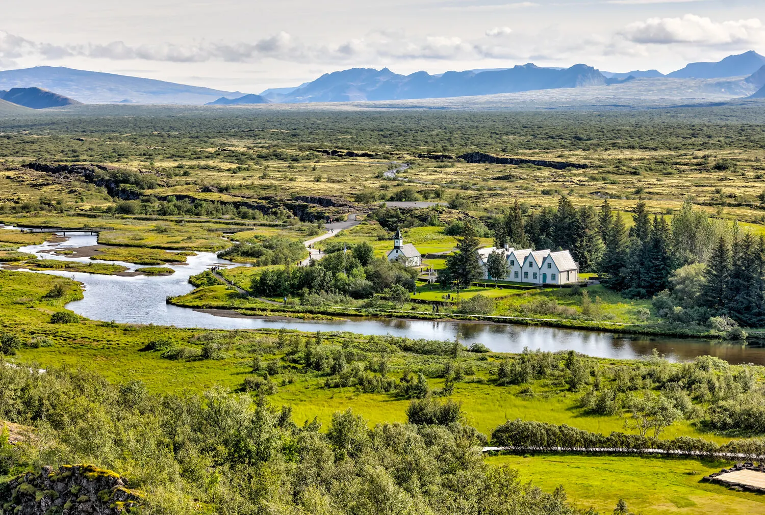 Aerial view of the Þingvellir valley with its historic church and farm buildings